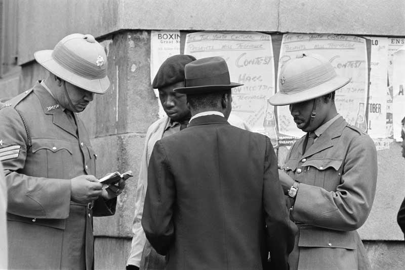 Police check passes for employers signature - Photograph by Ernest Cole