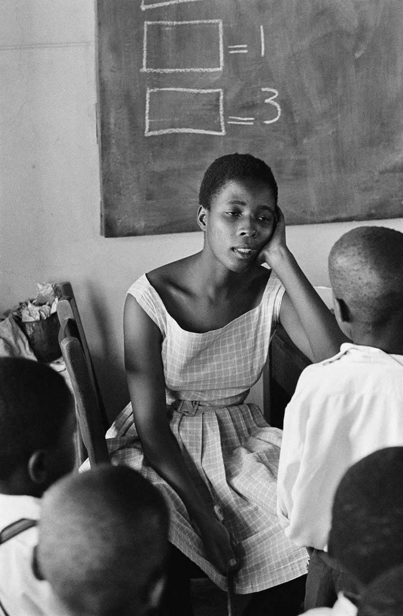 Teacher towards the end of her day in school in South Africa, 1960s - Photo by Ernest Cole