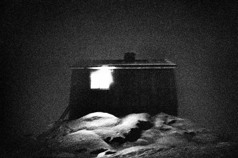 A dark grainy view of the hunting house, Jacob Aue Sobol