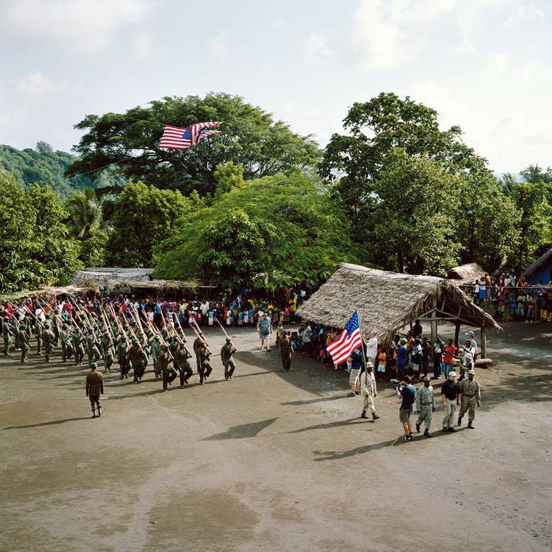 Military parade on a pacific island village. Photo by Jon Tonks