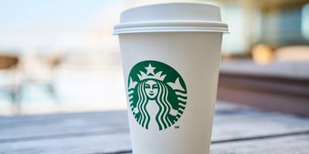 Starbucks logo on coffee cup