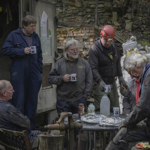 Group having hot drinks and picnic lunch - Nick Hodgson photography