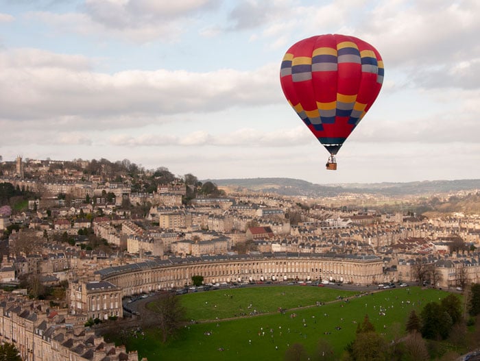 © Jesse Alexander - Hot air balloon flying over Royal Crescent in Bath