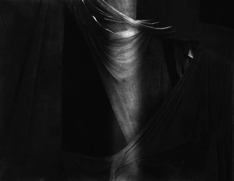 Photograph by Esther Vonplon - dark black and white stylised photo of sheets