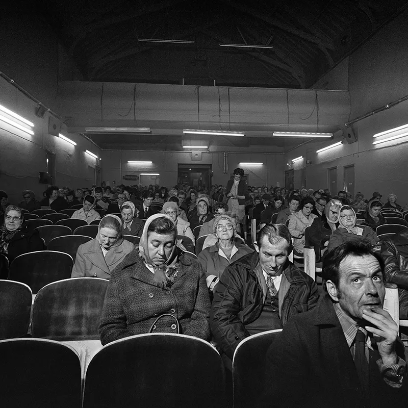 Bingo-goers in their headscarves ticking off the numbers in the repurposed cinema © Sirkka-Lissa Konttinen
